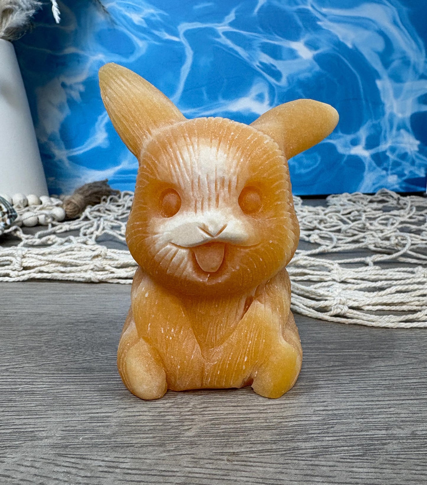 Orange calcite pikachu carving
